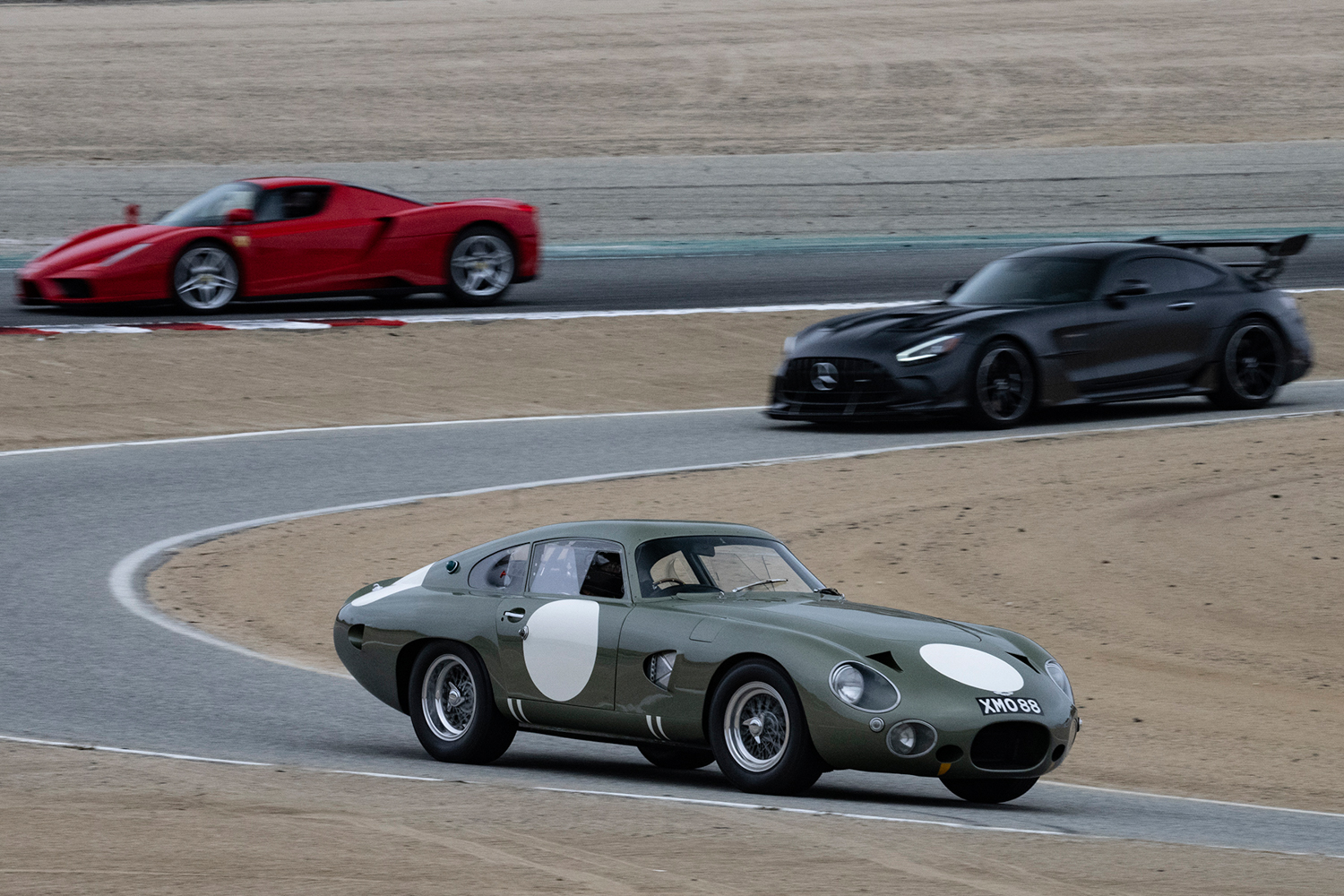 Demo runs by Aston Martin, Mercedes Benz and Ferrari. Dennis Gray