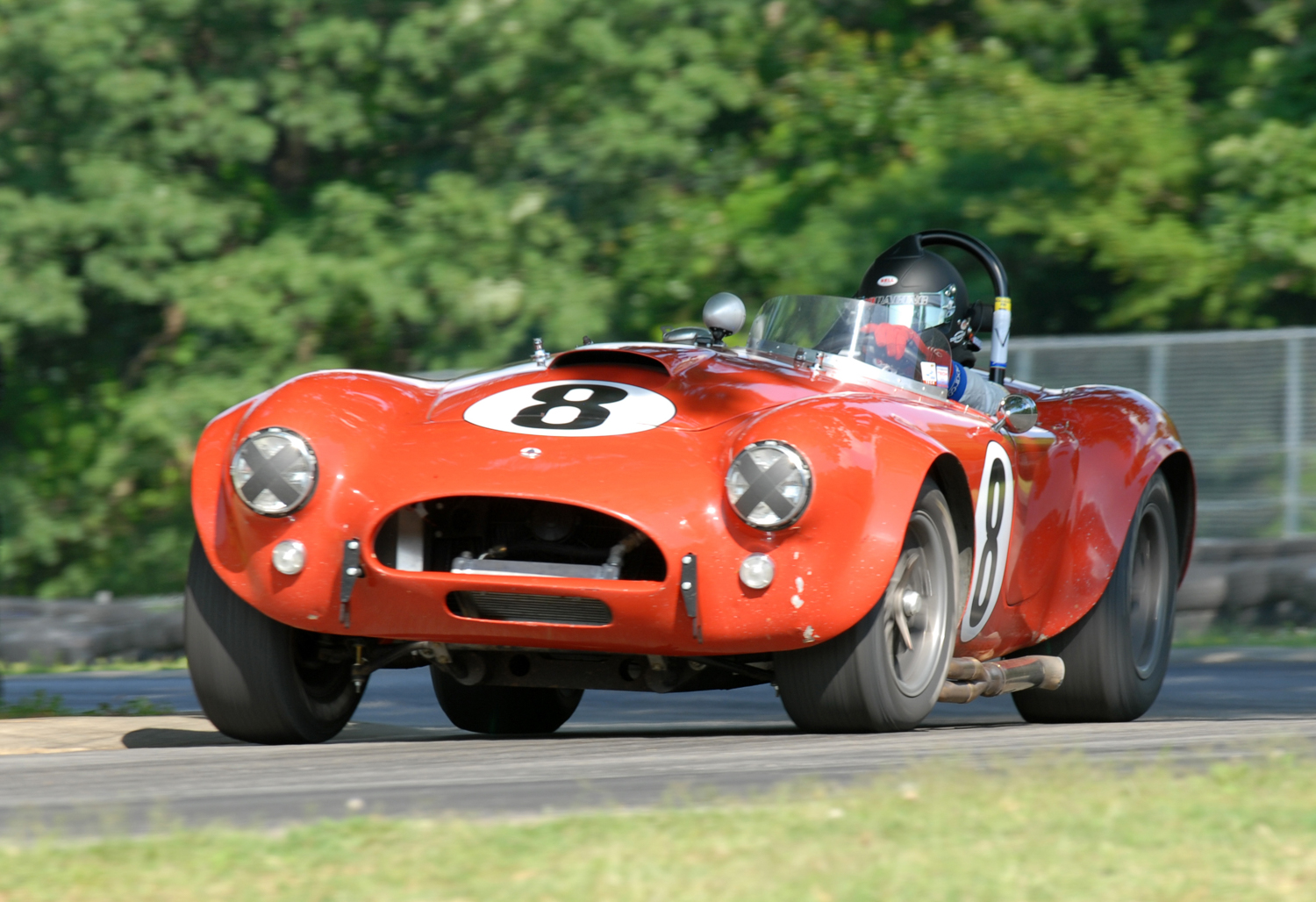 Lorne Leibel powers out of the Oak Tree turn in his 1964 Shelby Cobra 289. 