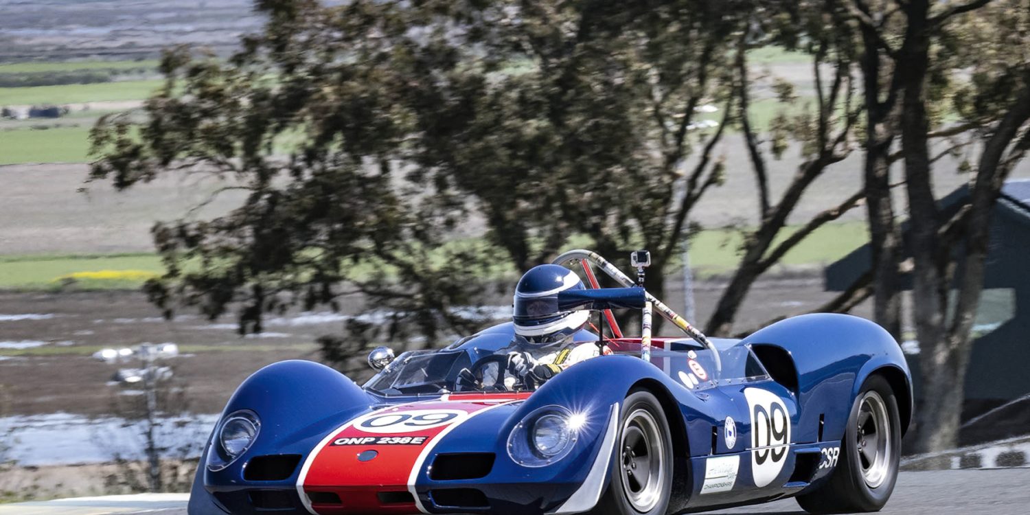 Group four Michael Malone's 1966 Elva Mk8 exiting turn two. Dennis Gray