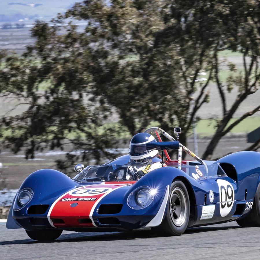 Group four Michael Malone's 1966 Elva Mk8 exiting turn two. Dennis Gray