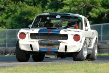 Brian Kennedy powers out of the Oak Tree turn in his 1966 Shelby GT350.