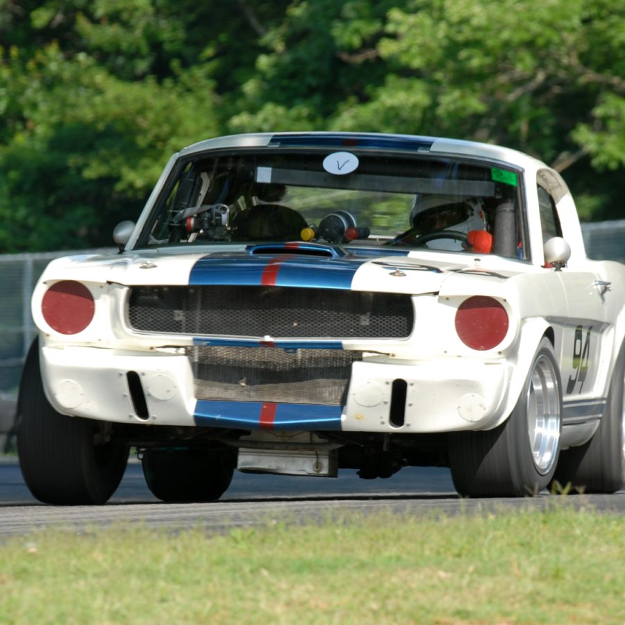 Brian Kennedy powers out of the Oak Tree turn in his 1966 Shelby GT350.