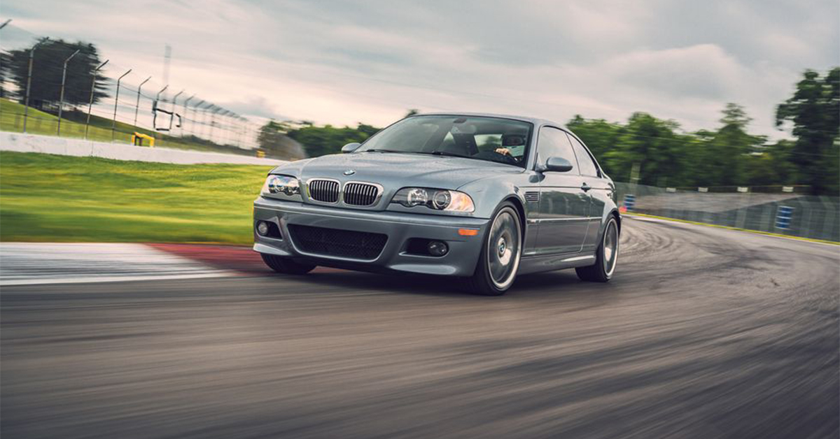 Silver BMW M3 E46 on a racetrack