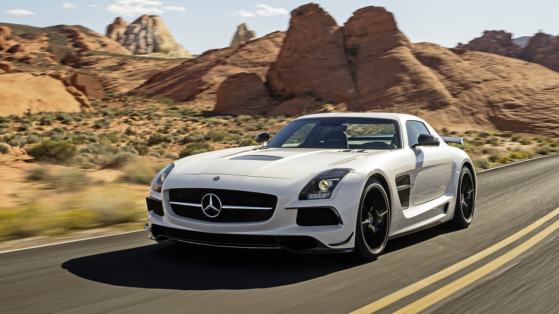 Photo of a white Mercedes-Benz SLS AMG Black Series cruising