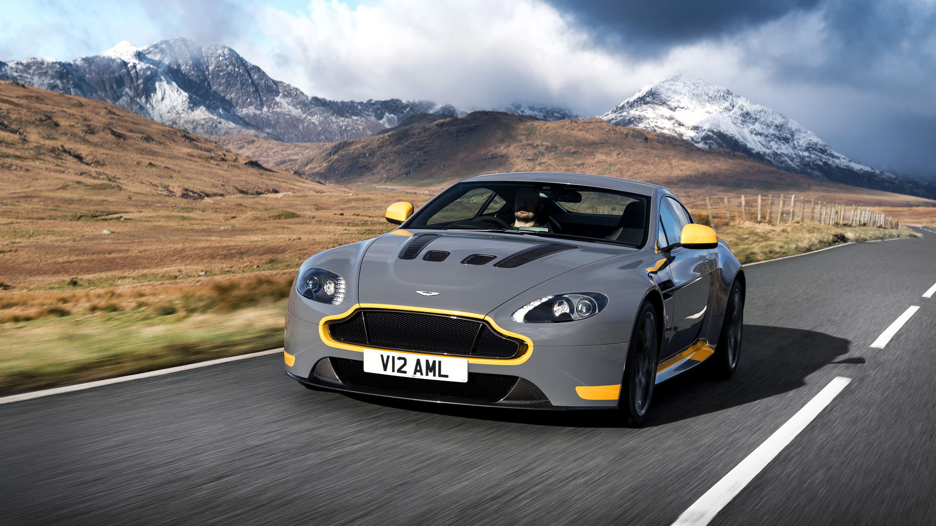 Photo of Aston Martin V12 Vantage S with mountain background