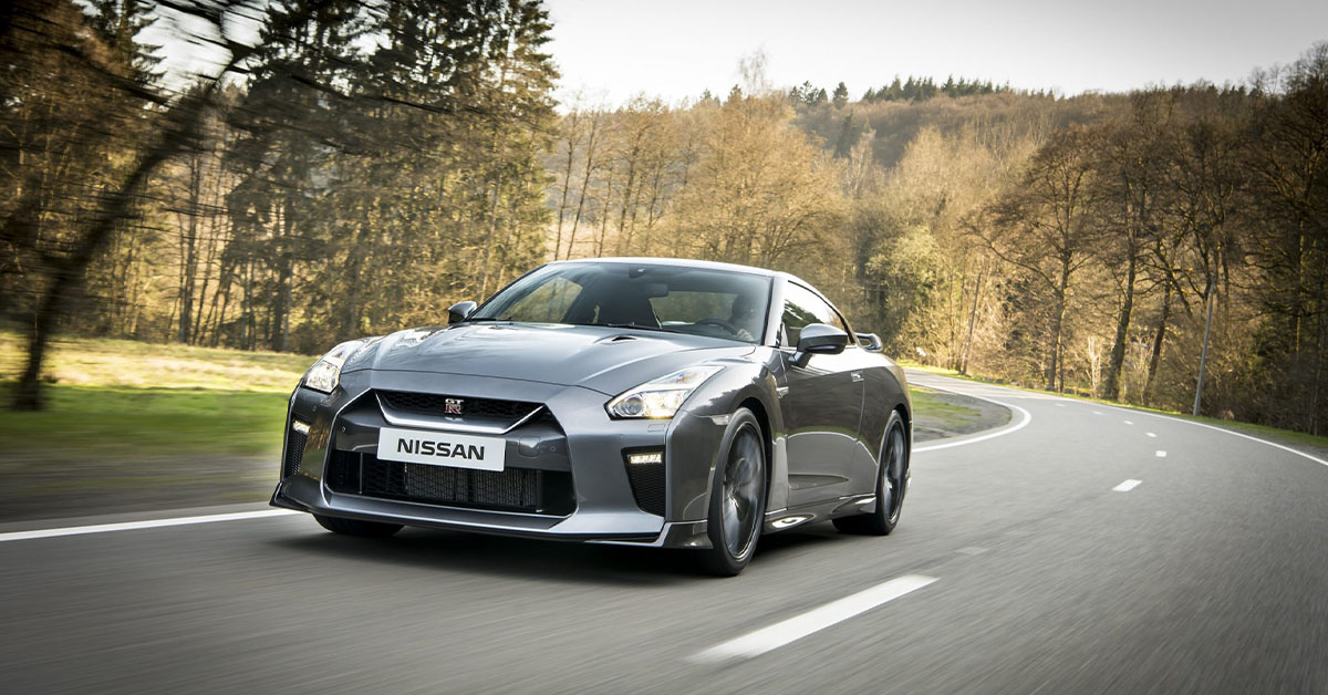 Photo of a grey Nissan GT-R Premium cruising