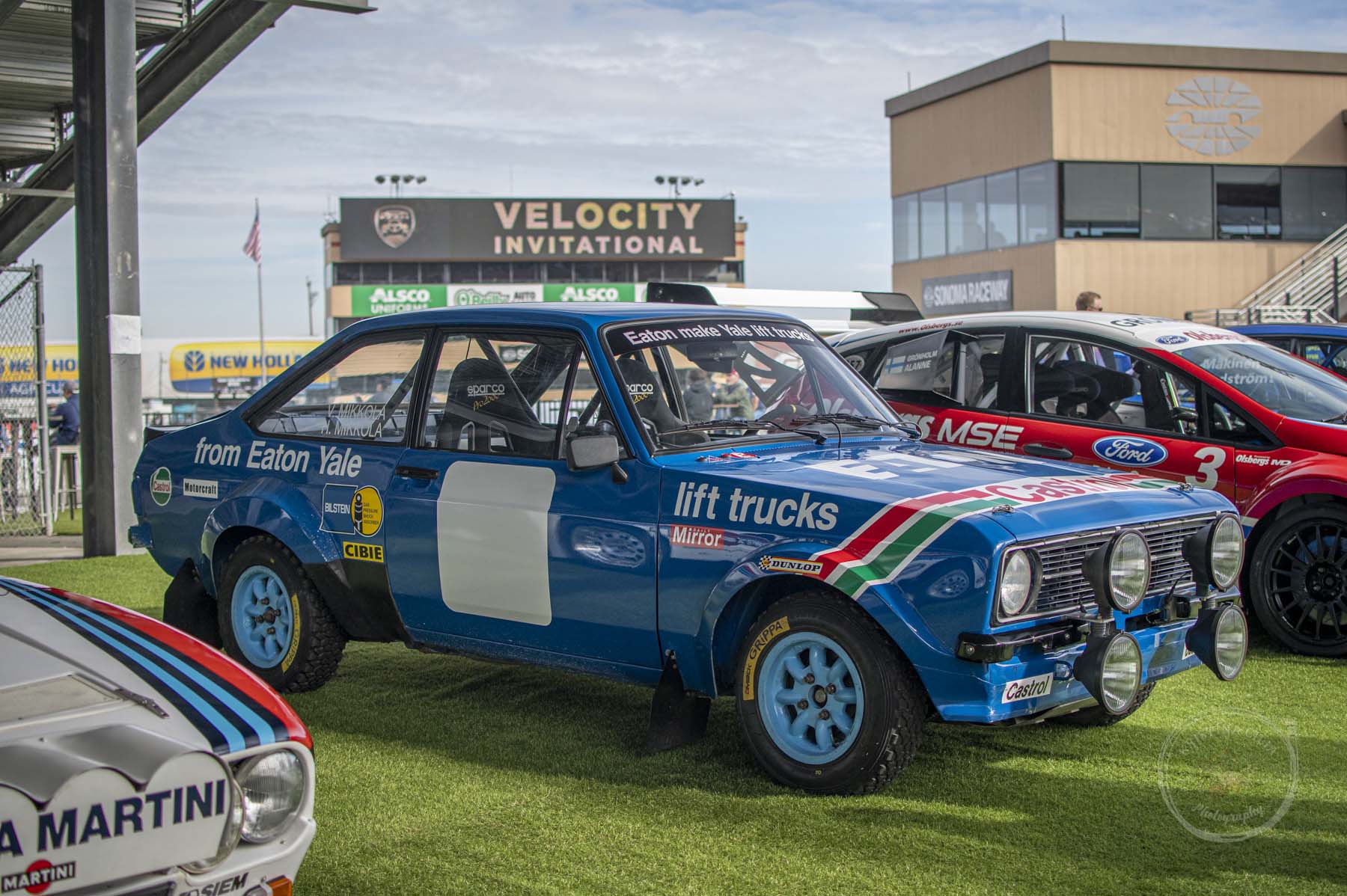 The Eaton Yale Ford Escort MK2 on display with a variety of Dirtfish Rally cars at Velocity Invitational 