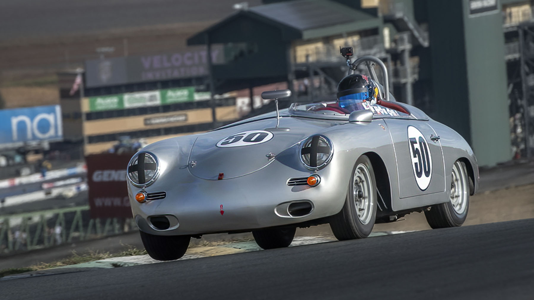 Tyler Hagan cruises out of Turn 2 in a 1960 Porsche 356 Roadster