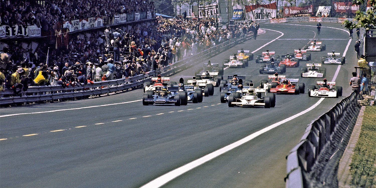 Start of the Grand Prix with the temporary pits and grandstands groaning under the weight of spectators.