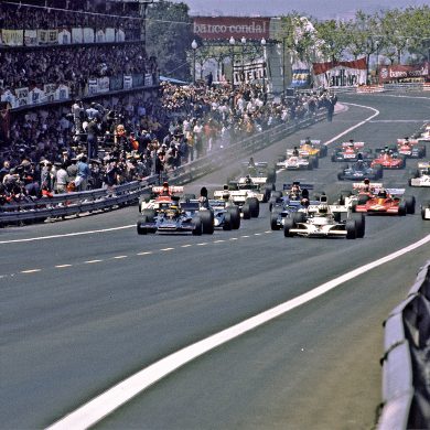 Start of the Grand Prix with the temporary pits and grandstands groaning under the weight of spectators.