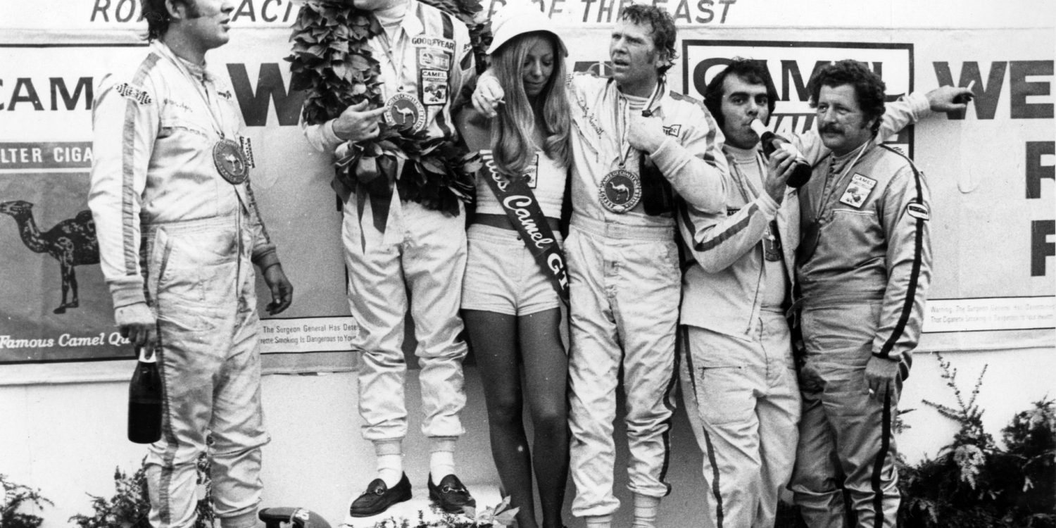 The winning 1973 Lime Rock Camel GT class drivers on the podium. L to R, Warren Agor, Peter Gregg, Ludwig Heimrath Jr. Dave Nichols and John Magee. Fast company indeed!
