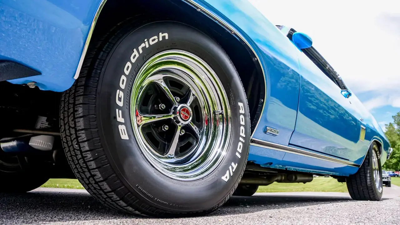 Close up of a BF Goodrich radial tire on a muscle car