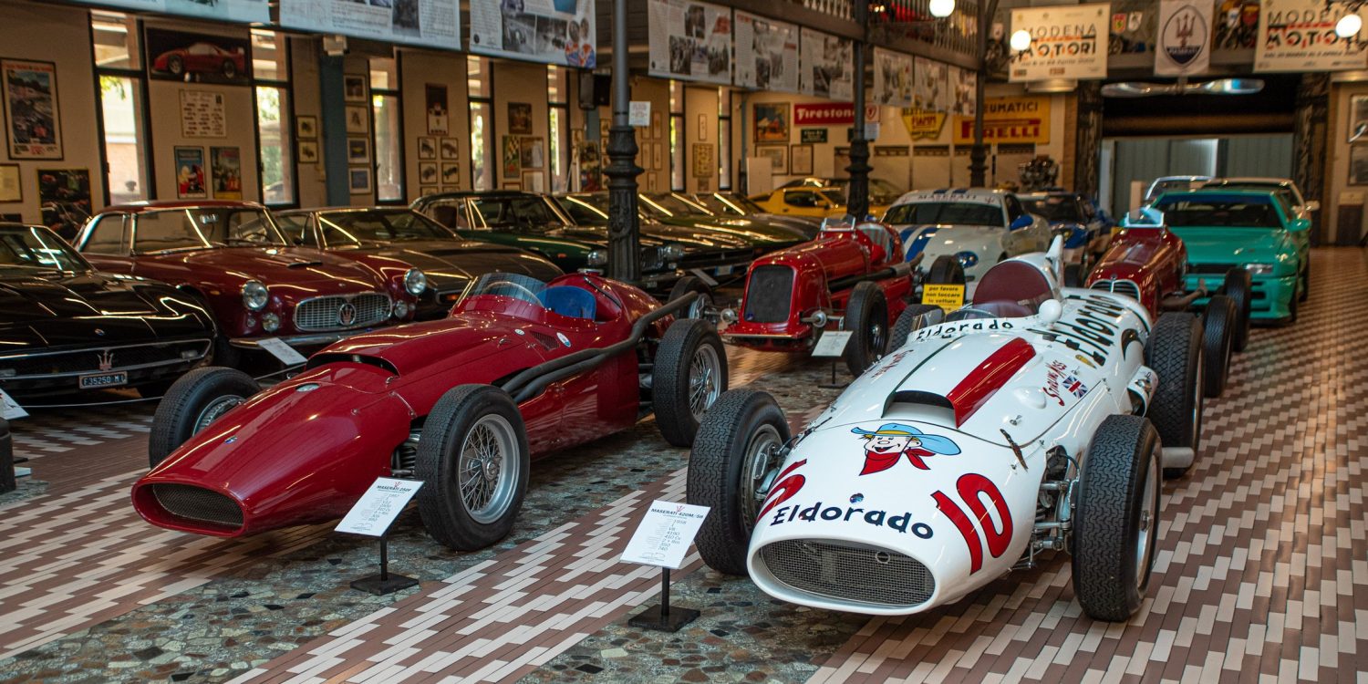 Greeting visitors to the Umberto Panini Motor Museum Collection, are: (left) 1957 Maserati 250 F - 2,500 cc V12 engine; and (right) 1958 Maserati 420M ‘Eldorado Special’ - 4,190 cc V8 engine. © Glen Smale