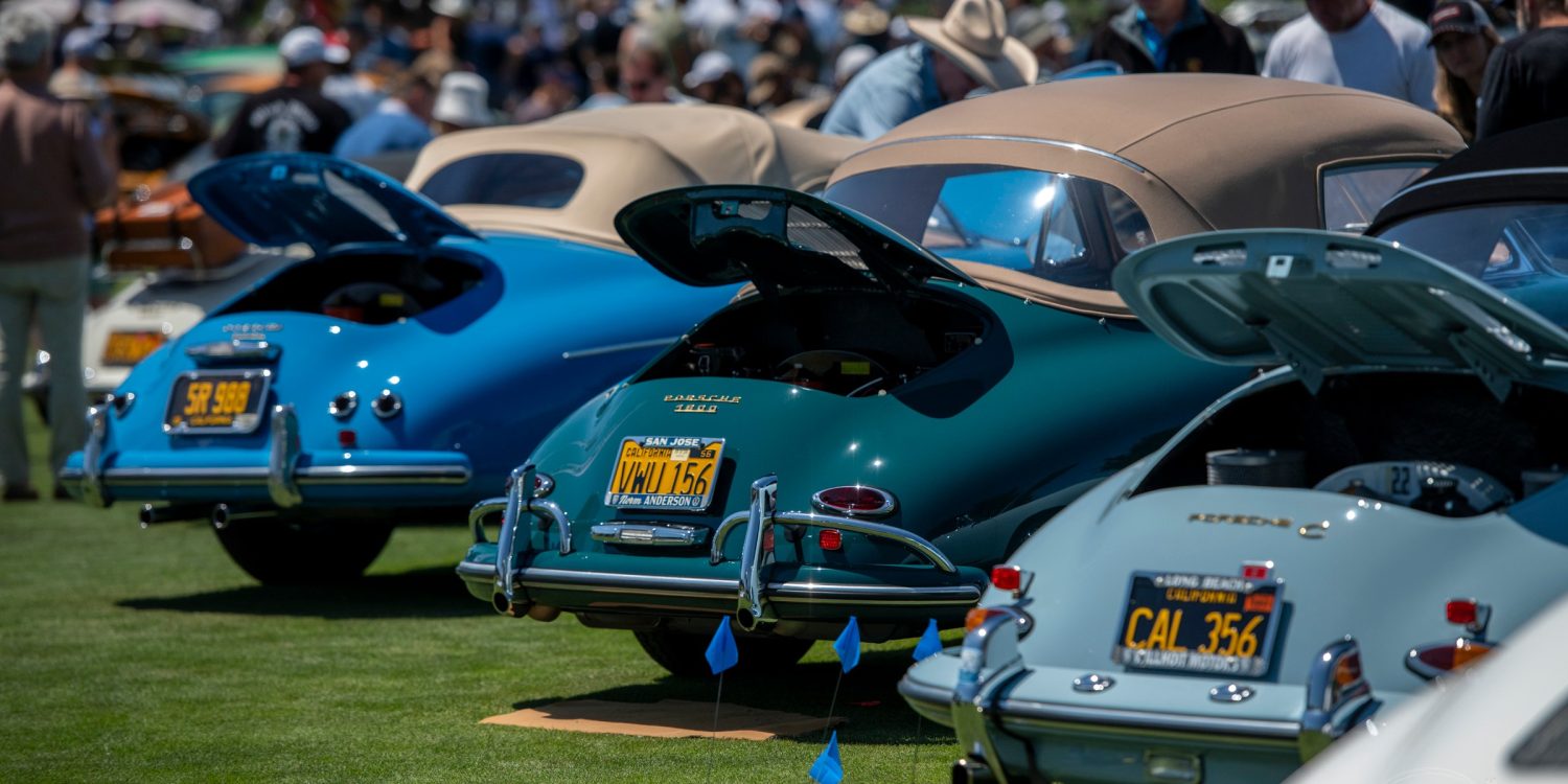 A variety of Porsche 356's line the show field