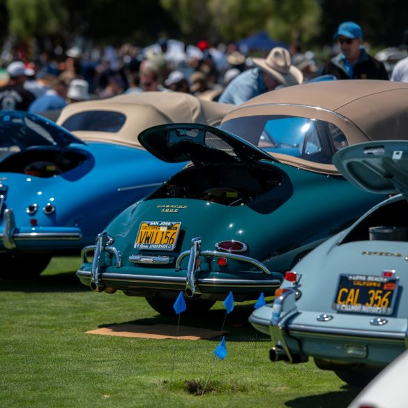 A variety of Porsche 356's line the show field
