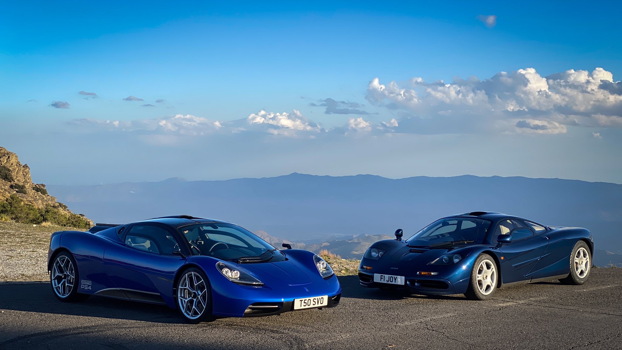 Blue GMA T.50 next to a blue McLaren F1