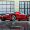 Three-quarter rear view of a 2003 red Ferrari Enzo