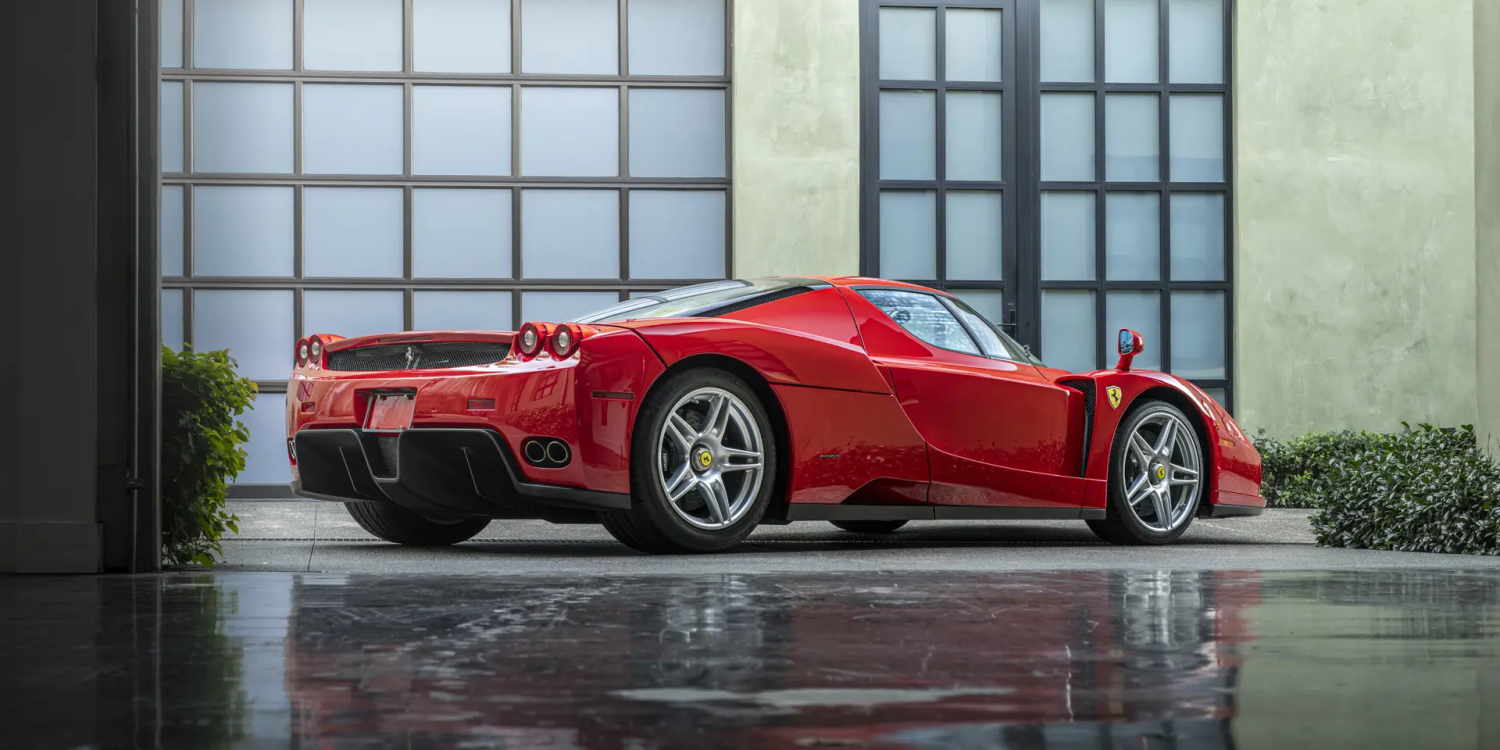 Three-quarter rear view of a 2003 red Ferrari Enzo