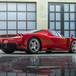 Three-quarter rear view of a 2003 red Ferrari Enzo