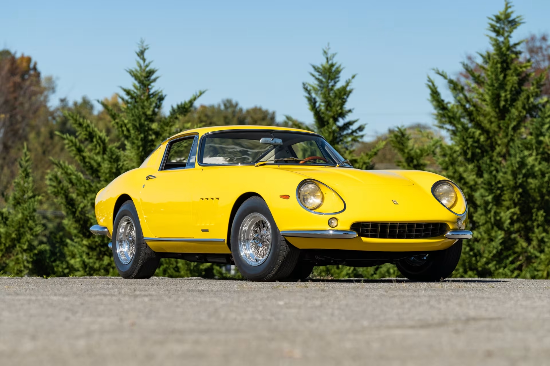 Three-quarter side view of a 1967 yellow Ferrari 275 GTB/4 Alloy from the Bachman Ferrari Collection