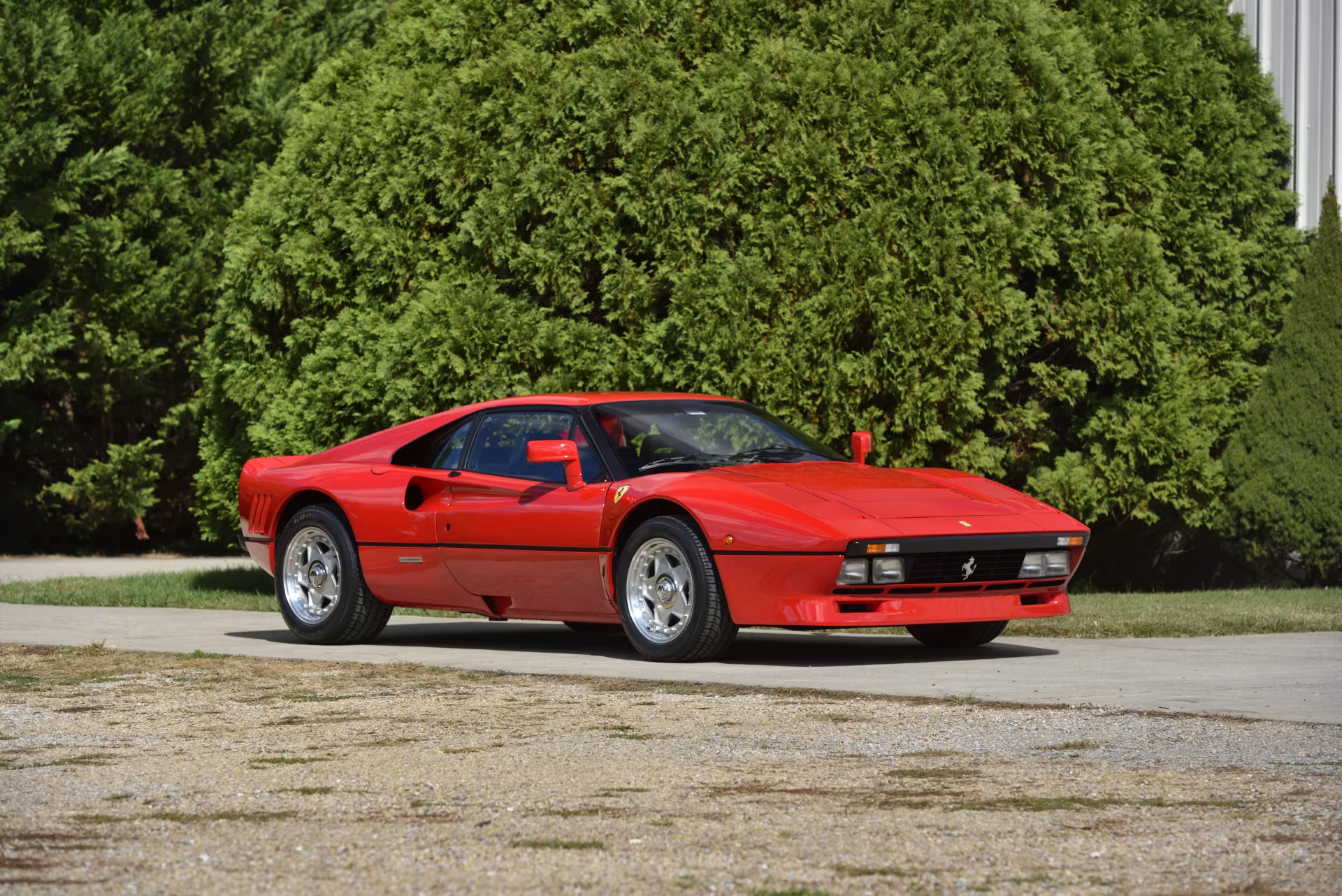 Three-quarter side view of a red 1985 Ferrari GTO from the Bachman Ferrari Collection