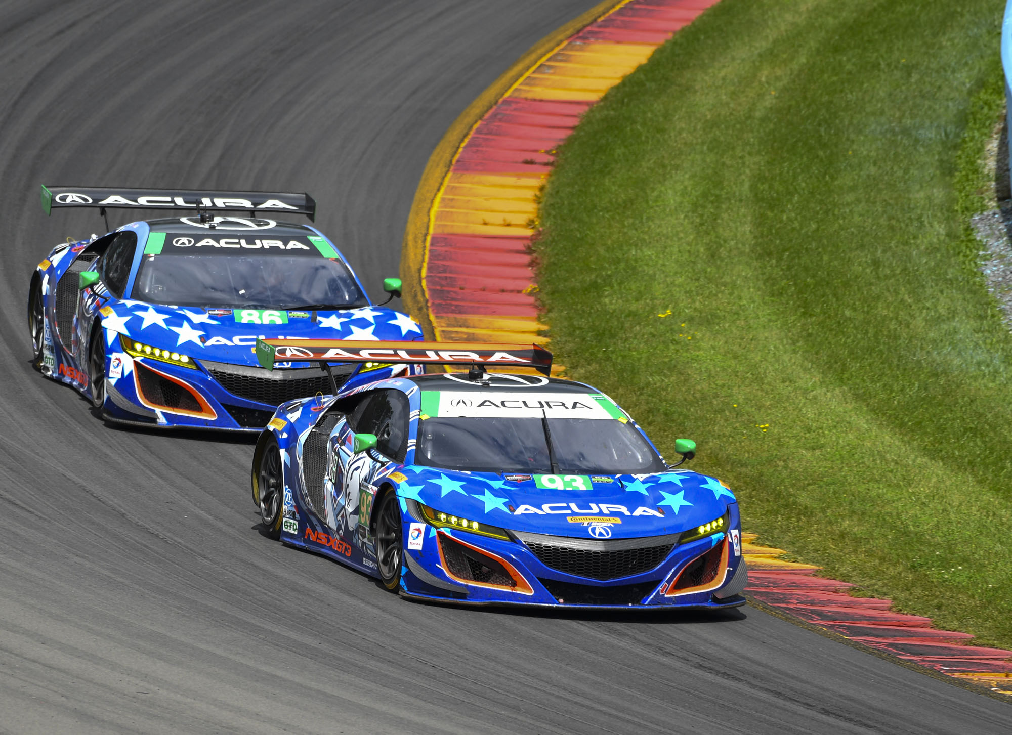 Both Michael Shank Racing Acura NSX GT3s featured patriotic live Honda